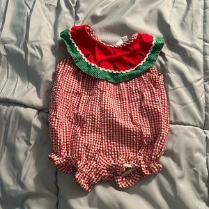 One in a melon outfit
